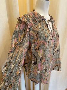 Contemporary Ulla Johnson sheer blouse with orange and pink floral pattern and sleeve ruffle