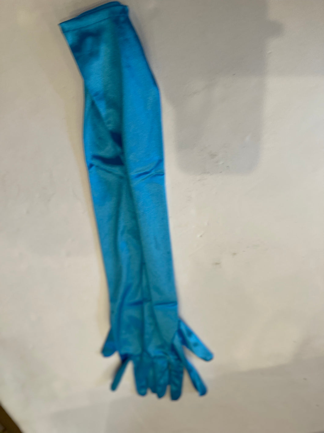 Turquoise, spandex, gloves