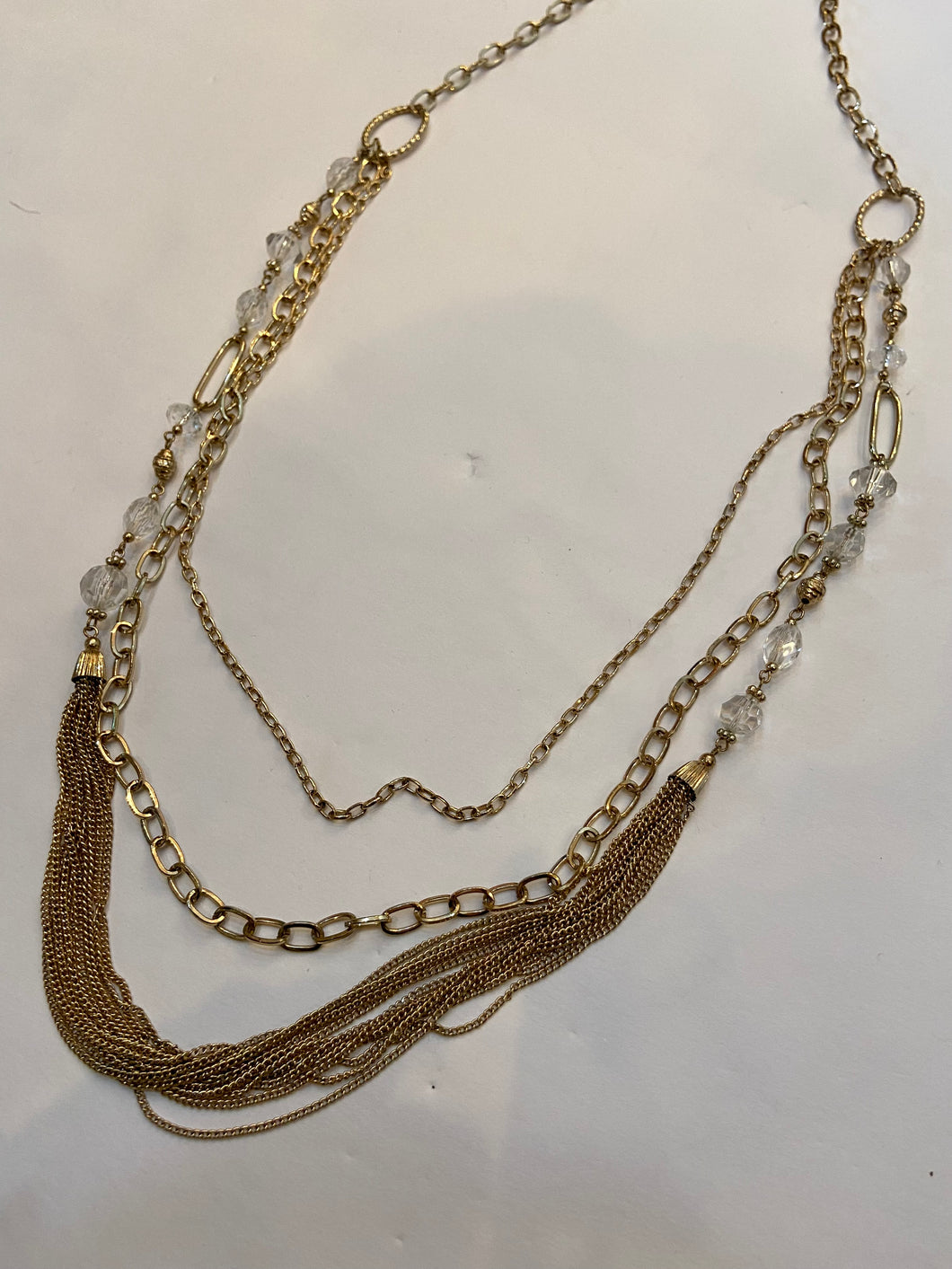 Multi-strand gold link necklace with clear crystal beads