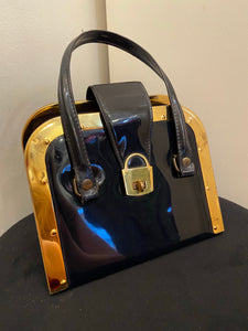 Vintage black patent handbag with gold frame and lock