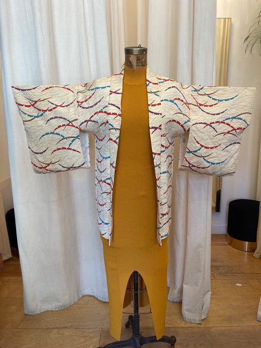 Abstract buttercream kimono with intricate inner lining pattern
