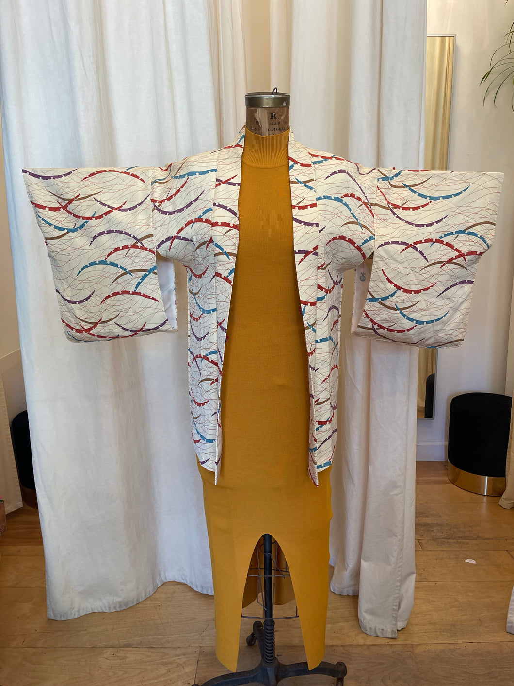 Abstract buttercream kimono with intricate inner lining pattern