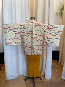 Abstract buttercream kimono with intricate inner lining pattern