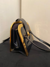 Load image into Gallery viewer, Vintage black patent handbag with gold frame and lock