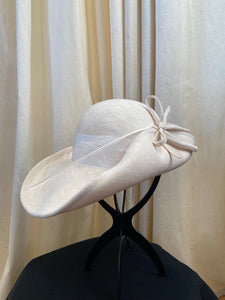 Vintage cream wide brim hat with rhinestone bow and feather