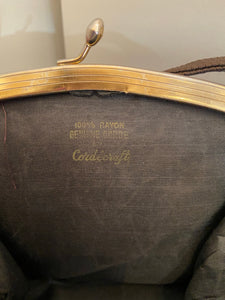 Vintage black patent handbag with gold frame and lock