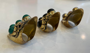 Ornate brass and stone rings